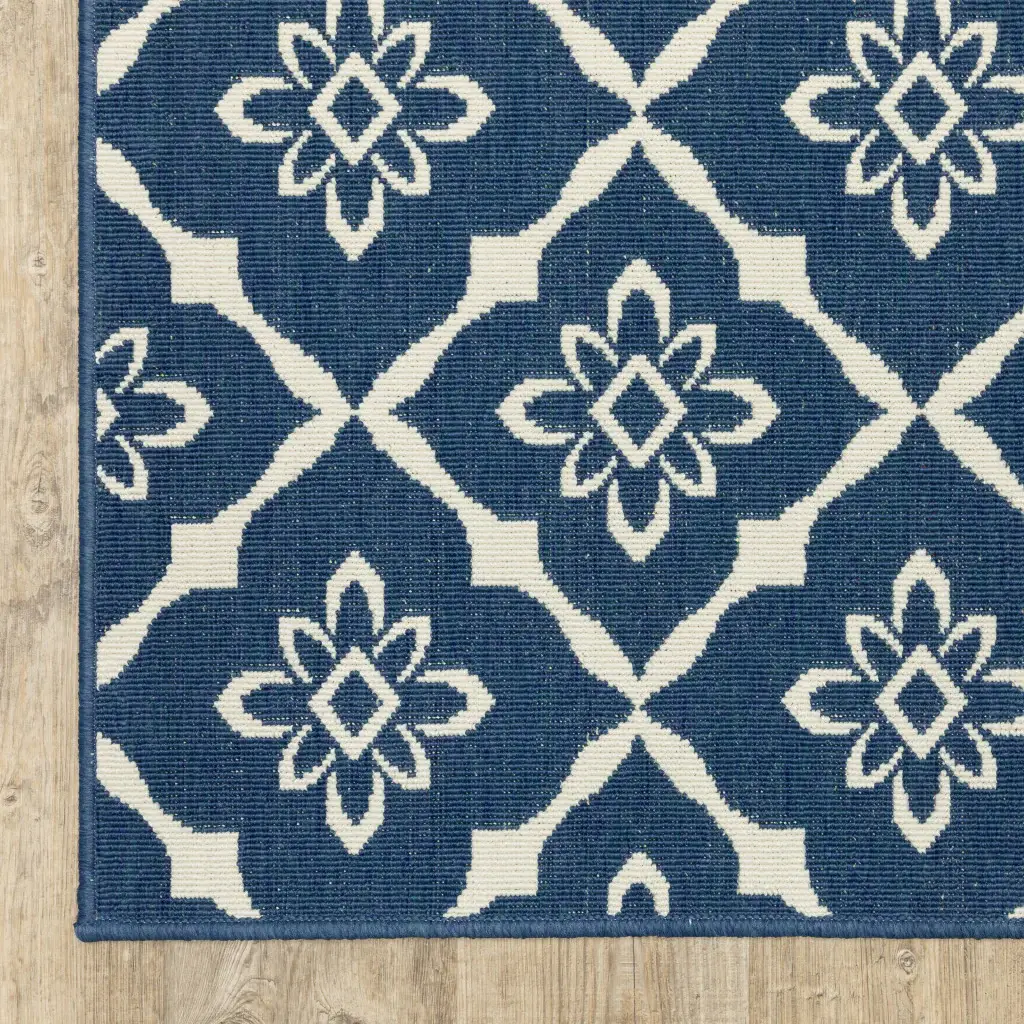 9' X 13' Blue and Ivory Floral Stain Resistant Indoor Outdoor Area Rug - Image 4