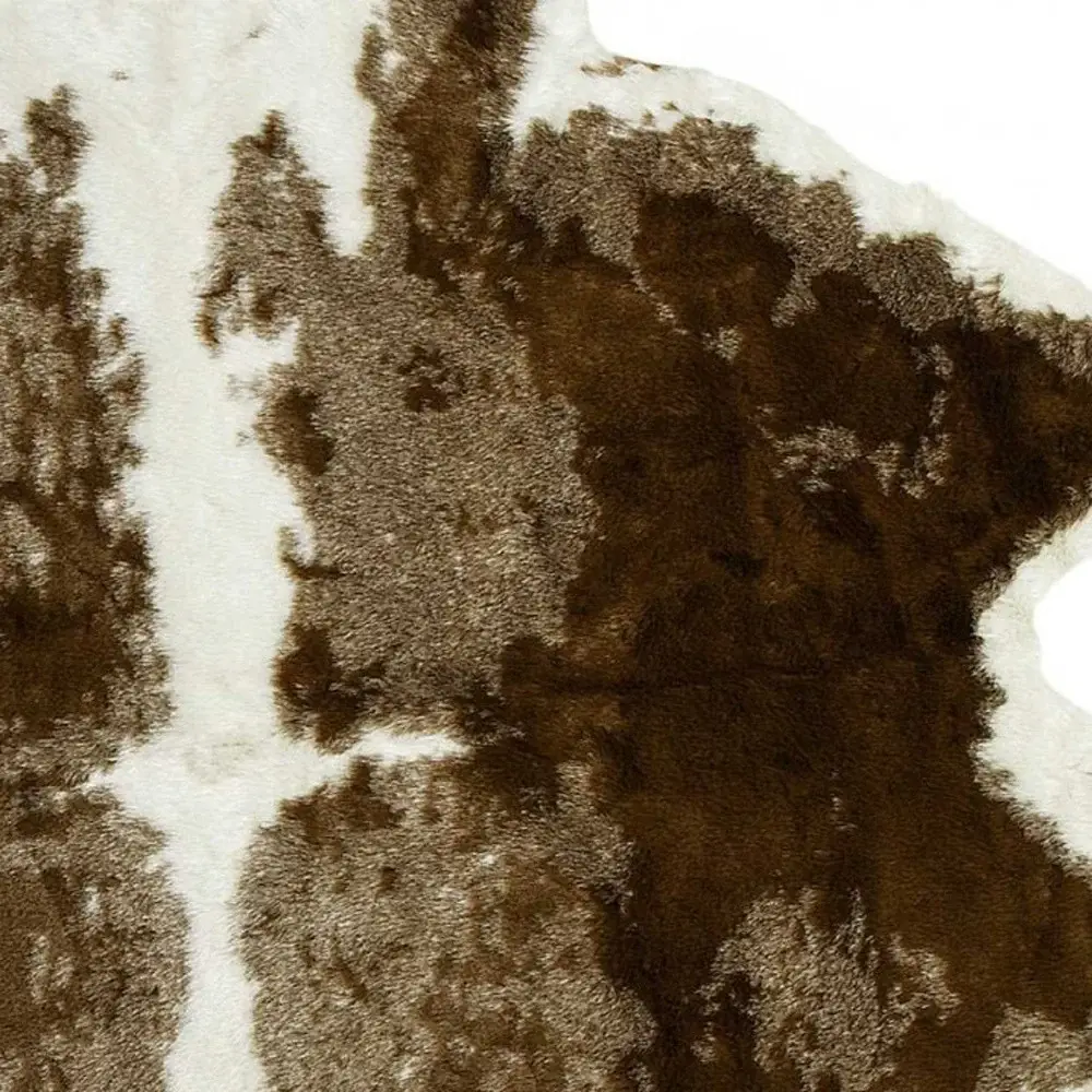 Brown And White Animal Print Area Rug - Image 5